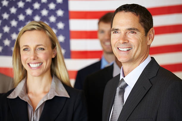 istock Smiling business associates 471319427