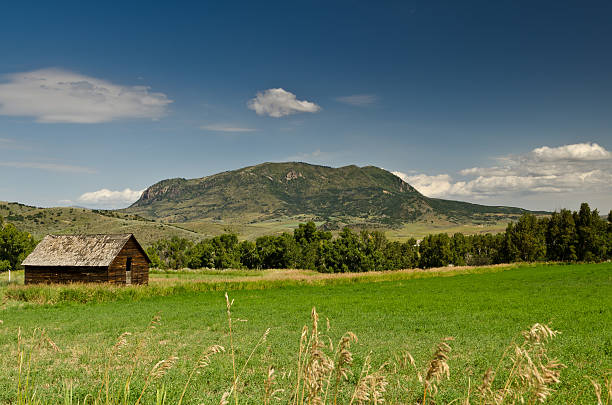 Old Barn and Mountain Landscape stock photo