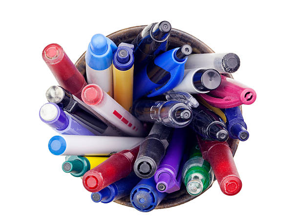 Pens, Pencils, and Markers in a Cup Holder stock photo