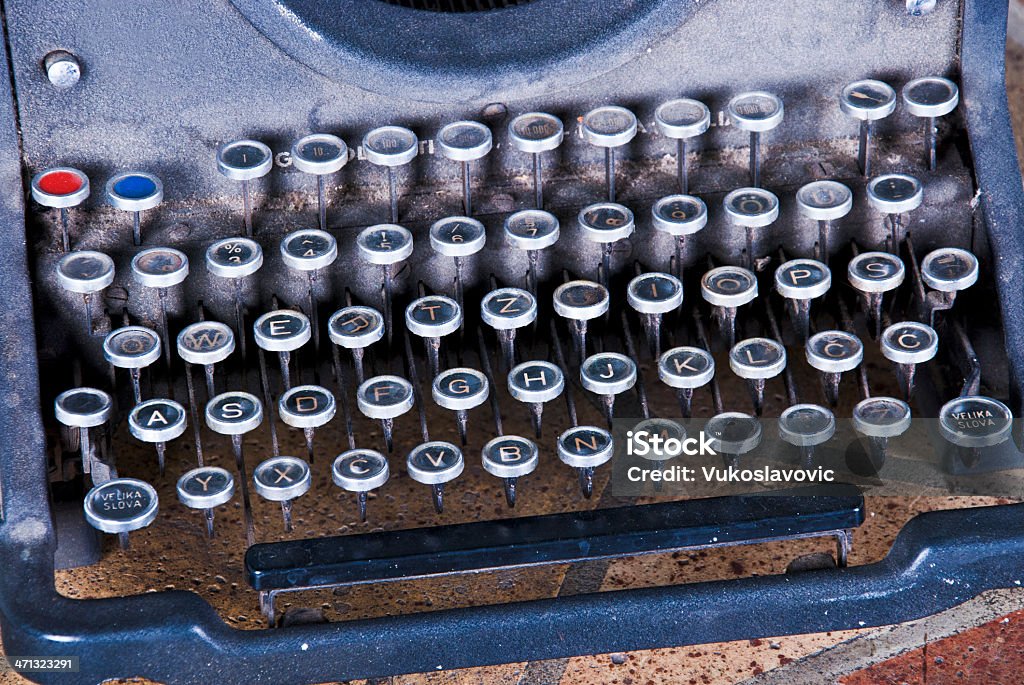 Vintage typewriter Old antique typewriter with European keys. Antique Stock Photo