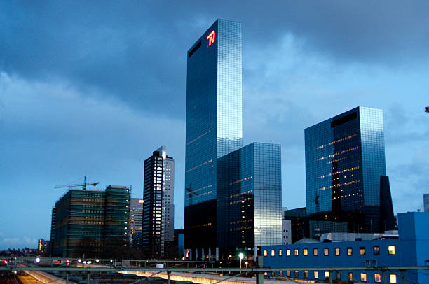 Rotterdam, The Netherlands - December 6, 2008: Head office of Nationale Nederlanden in Rotterdam, at sunset. With reflection on building