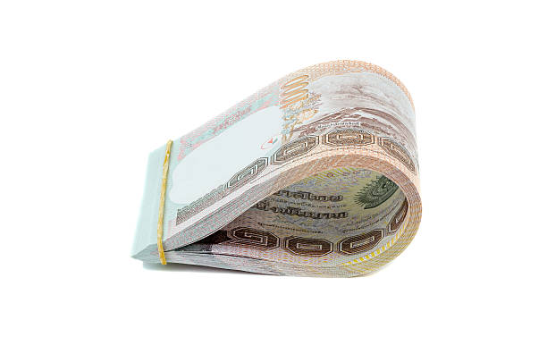 istock Stack of Thai baht cash on isolated background 471325452