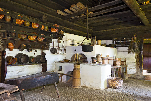 Old Rustic Kitchen Interior Vintage rustic kitchen interior in an old farmhouse, Malopolskie Province, Poland butter churn stock pictures, royalty-free photos & images