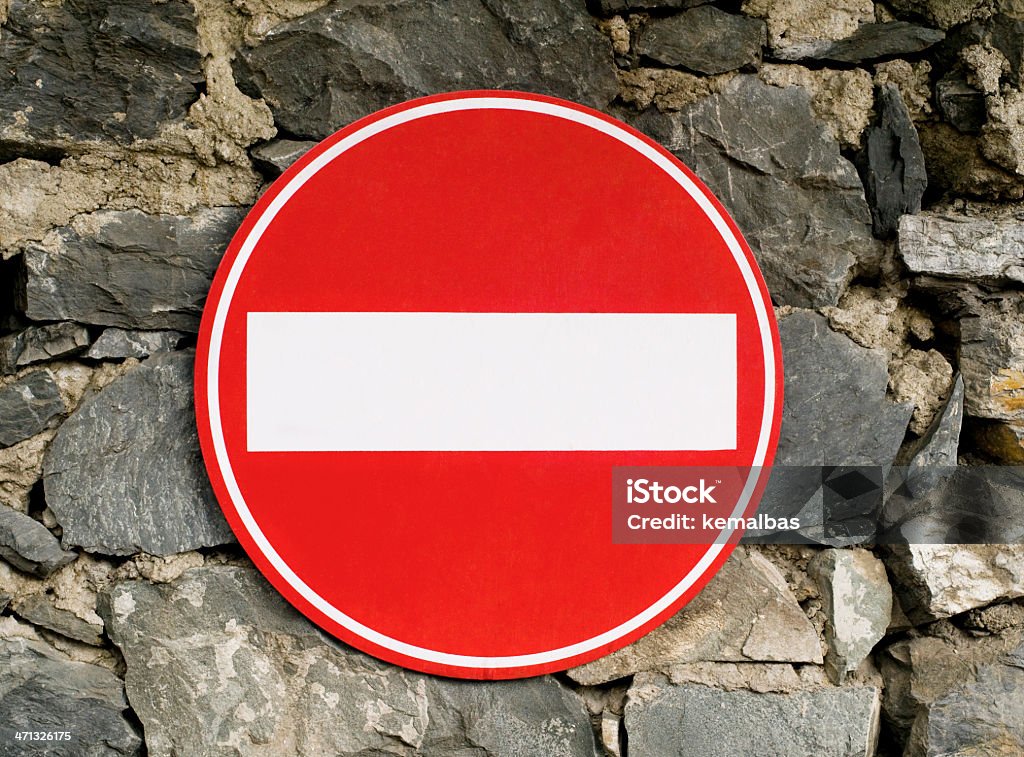 no entry warning sign no entry warning sign on stone wall. Brick Wall Stock Photo