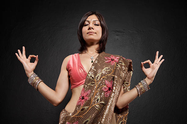 istock Young woman in traditional Indian clothes 471326543