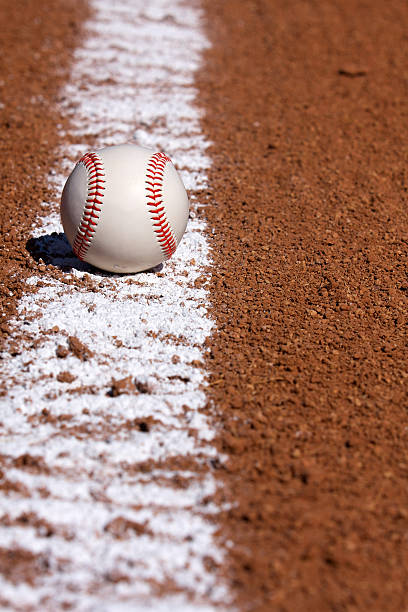 istock Baseball on the Chalk Line 471326671