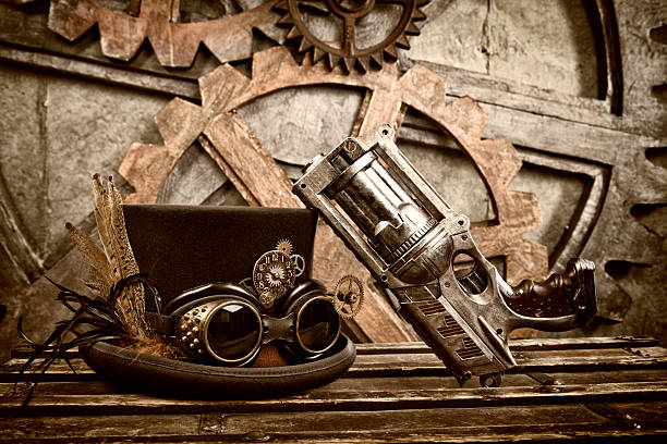 Steampunk Still Life Steampunk Gun with Top Hat and Goggles. steampunk pistol pictures stock pictures, royalty-free photos & images