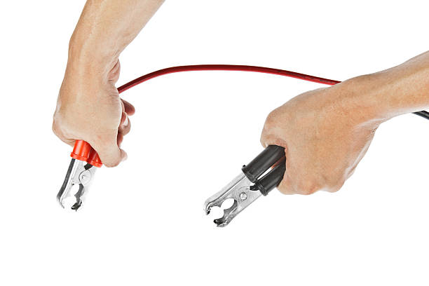 istock Human hand giving to charge battery 471331839