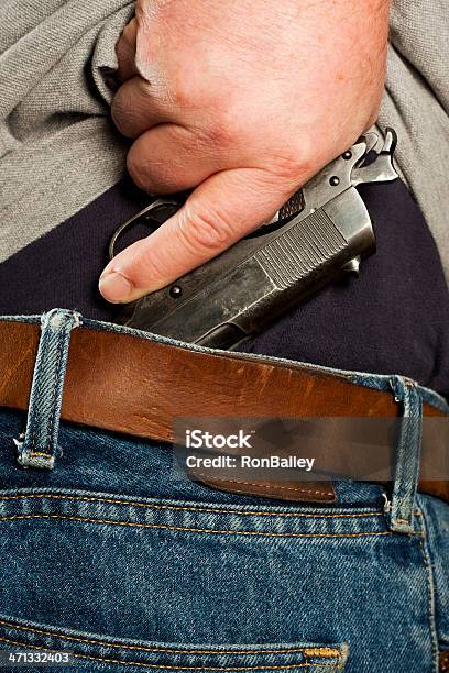 Mexican Carry Concealed Firearm Drawn From Waistband Stock Photo - Download Image Now