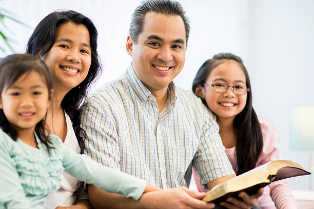 istock Family Portrait with Bible 471332638