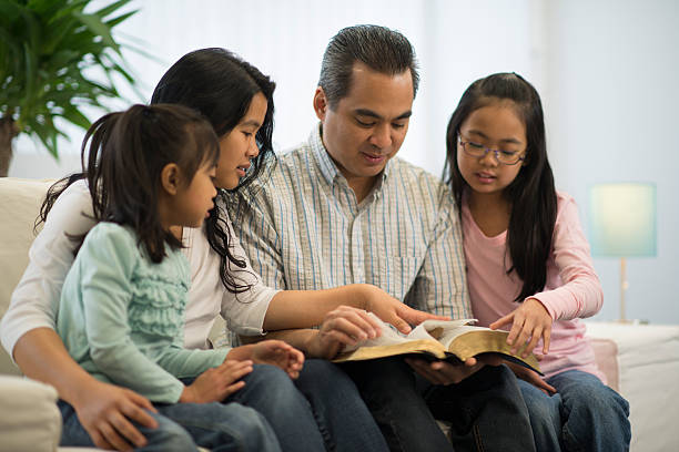 istock Family Reading Bible 471332640