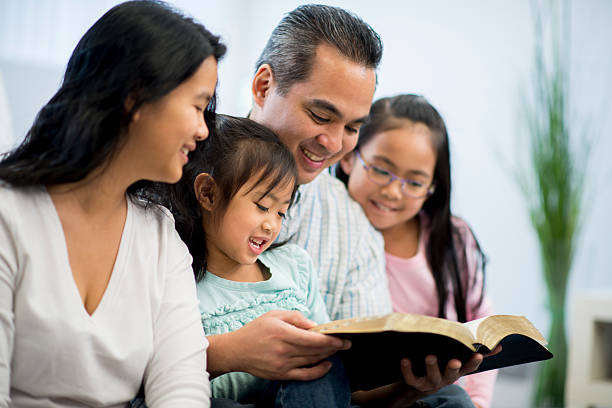 istock Parents and Children Studying Bible 471332644