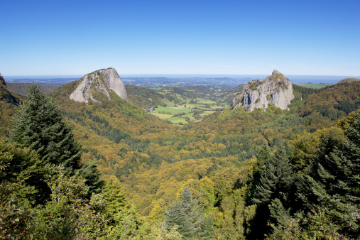 Beautiful valley with rock formations (roche Tuiliere and Sanadoire) in The Auvergne, France.