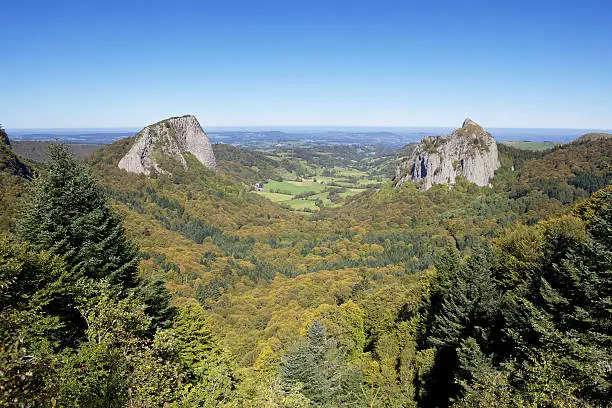 Beautiful valley with rock formations (roche Tuiliere and Sanadoire) in The Auvergne, France.
