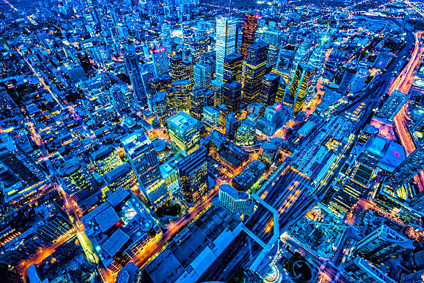 Toronto financial district cityscape at dusk Toronto financial district cityscape at dusk, Ontario, Canada. View from CN tower. Selective focus in the middle of image. Check details on zoomed image. toronto stock pictures, royalty-free photos & images
