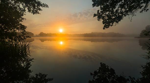 istock Lake sunrise in summer 471336144