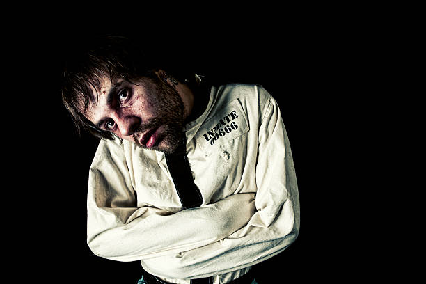 Inmate 00666 and his nice white jacket that does up in the back.