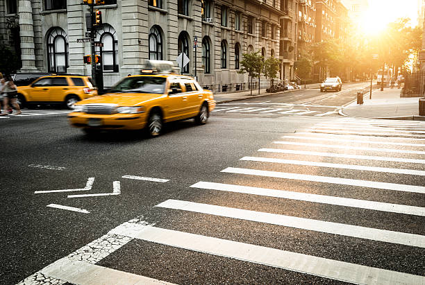 istock taxi running fast on nyc 471337614