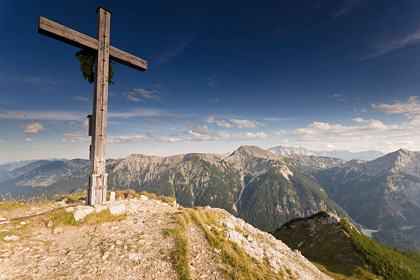 istock Cross on mountain top in German Alps 471337829