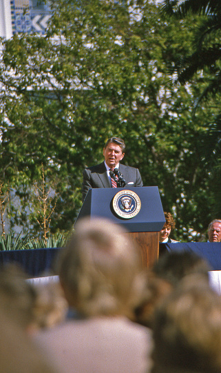 San Diego, CA, USA - October 22, 1984; President Ronald Reagan giving a speech at a campaign rally at the San Diego County Administration building.