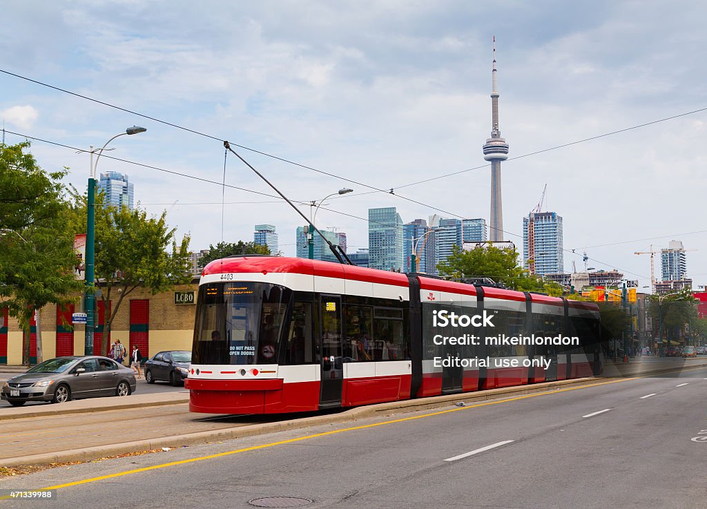 Toronto New Streetcars Toronto, Canada - September 9, 2014: A view of the new Toronto Street Cars during the day. Passengers can be seen on the vehicle Cable Car Stock Photo