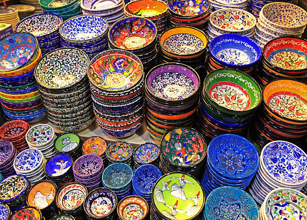istock Stacks of colorful pottery plates and bowls 471340495