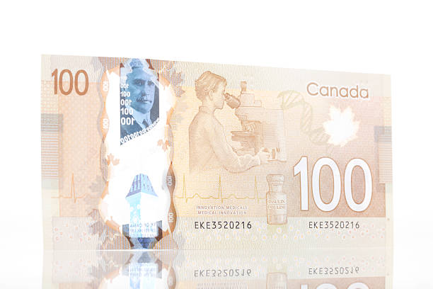 nowe polimer banknot 100 dolarów kanadyjskich-back - canadian dollars canada bill one hundred dollar bill zdjęcia i obrazy z banku zdjęć