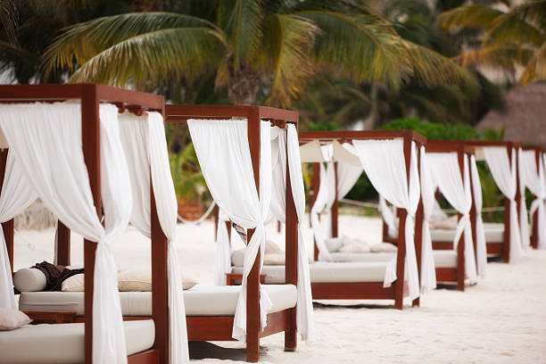 istock Beach beds waiting for their guests 471341601