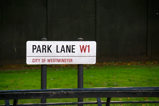 Footpath Sign to Hyde Park Corner in City of Westminster, London. It also shows the way to Trafalgar Square, Charing Cross and Westminster, with the Royal Parks symbol at the top