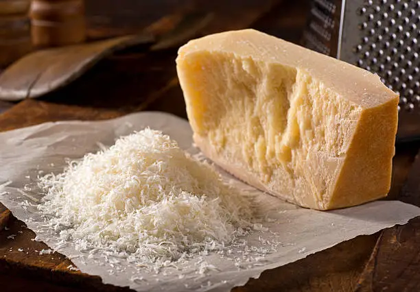Freshly grated parmigiano reggiano parmesan cheese.