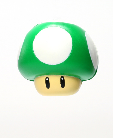 Vancouver, Canada - November 3, 2011: A 1-Up Mushroom from the Mario Bros. franchise of computer games, against a white background.