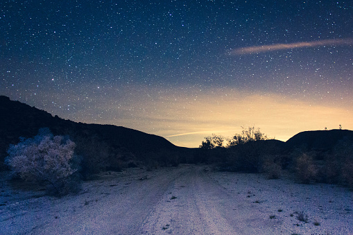 road through the desert at night