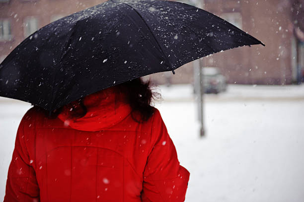 istock Girl with an umbrella 471345887