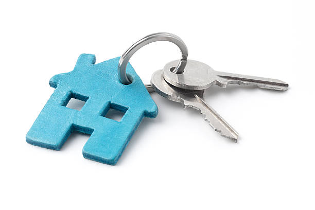 Keys on a ring with blue house keychain