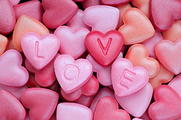 istock Colorful, heart shaped candies suitable for Valentine greetings 471348391