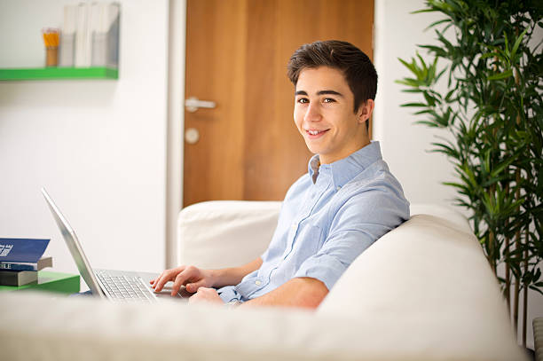 istock young man on his laptop 471348483