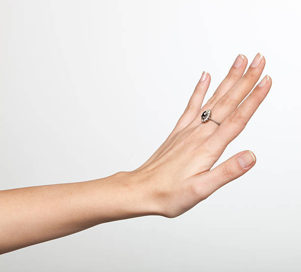 Cтоковое фото Женщина руки с прекрасные кольцо