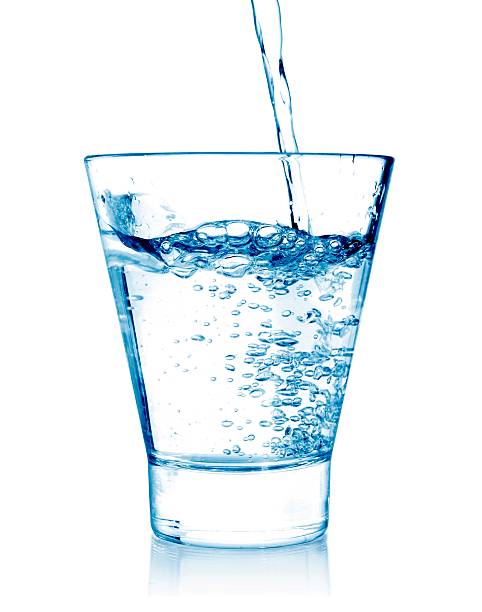 istock clear water being poured into a glass cup 471349638