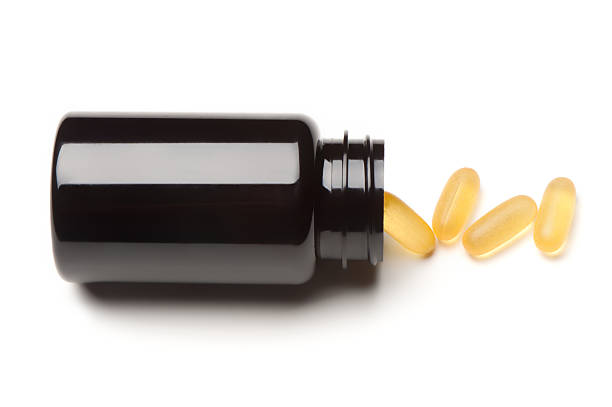 医学マルチビタミンボトル白背景 - nutritional supplement fish oil vitamin pill bottle ストックフォトと画像