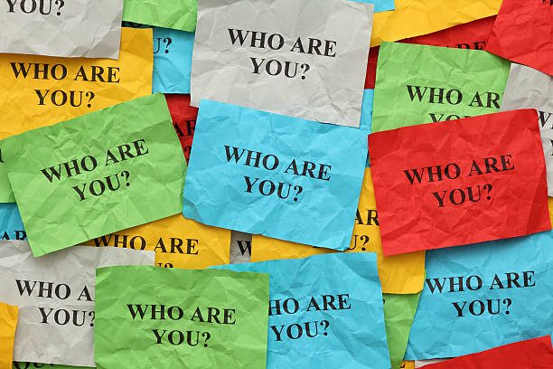istock Crumpled colorful paper notes with the question 