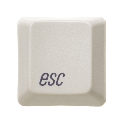 A picture of the escape key of a keyboard.