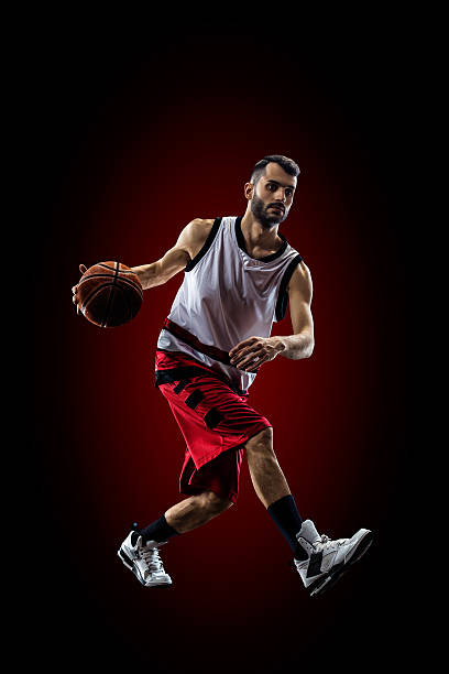 istock Basketball player in action is flying high 471354440