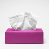 Pink tissue box with white tissues