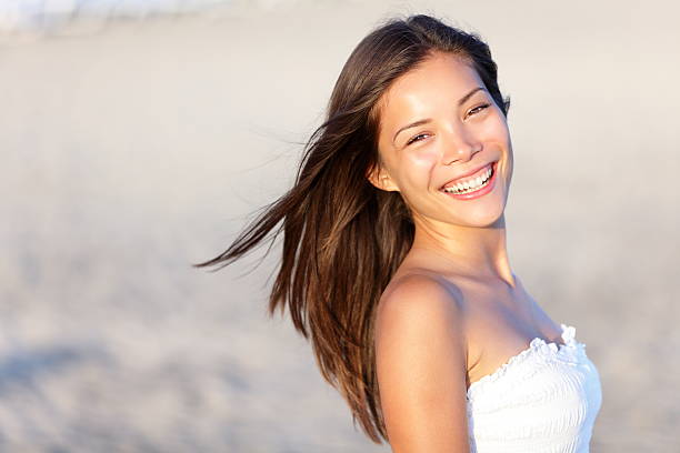 istock Asian woman on beach 471355353