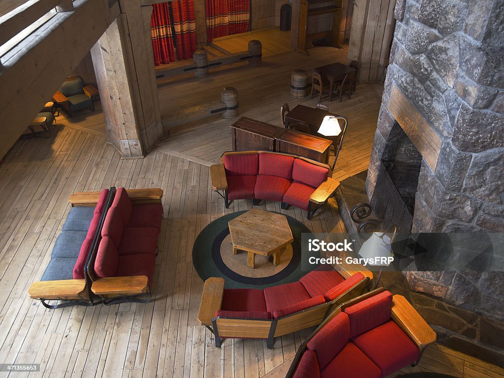 Timberline Lodge with Interior Chairs by Fireplace Mount Hood Oregon Furniture and Fireplace in Timberline Lodge, a National Historic Landmark.Taken with natural light and no guests in picture.  This is on Mt Hood located in Northwest Oregon. Lobby Stock Photo