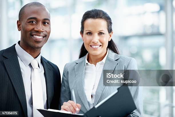 Combining All Our Corporate Savvy Stock Photo - Download Image Now - Adult, Adults Only, African Ethnicity