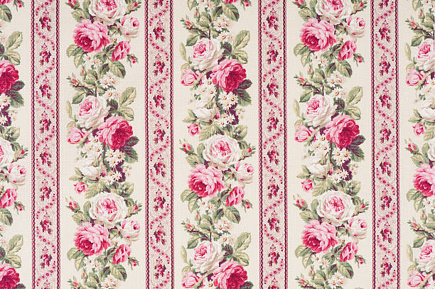 Antique beige floral fabric with a vines of white and pink flowers creating an effect of pink and creme colored stripes..