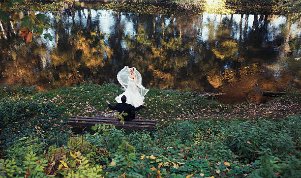istock Beautiful wedding couple posing in forest 471356838