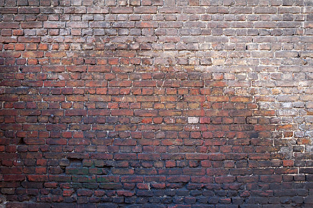 istock Texture of old red brick wall 471357244