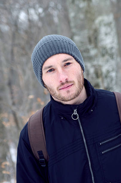 istock portrait of a young man in a cap 471357738